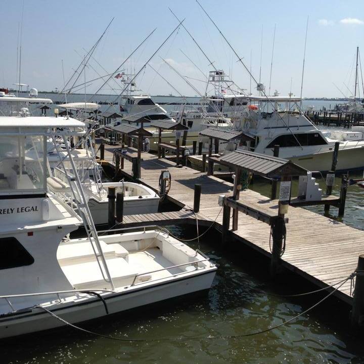 1005489_575972459115806_347521166_n boats that are docked next to a body of water