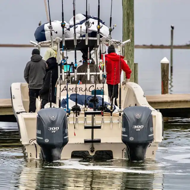 a group of people on a boat in the water