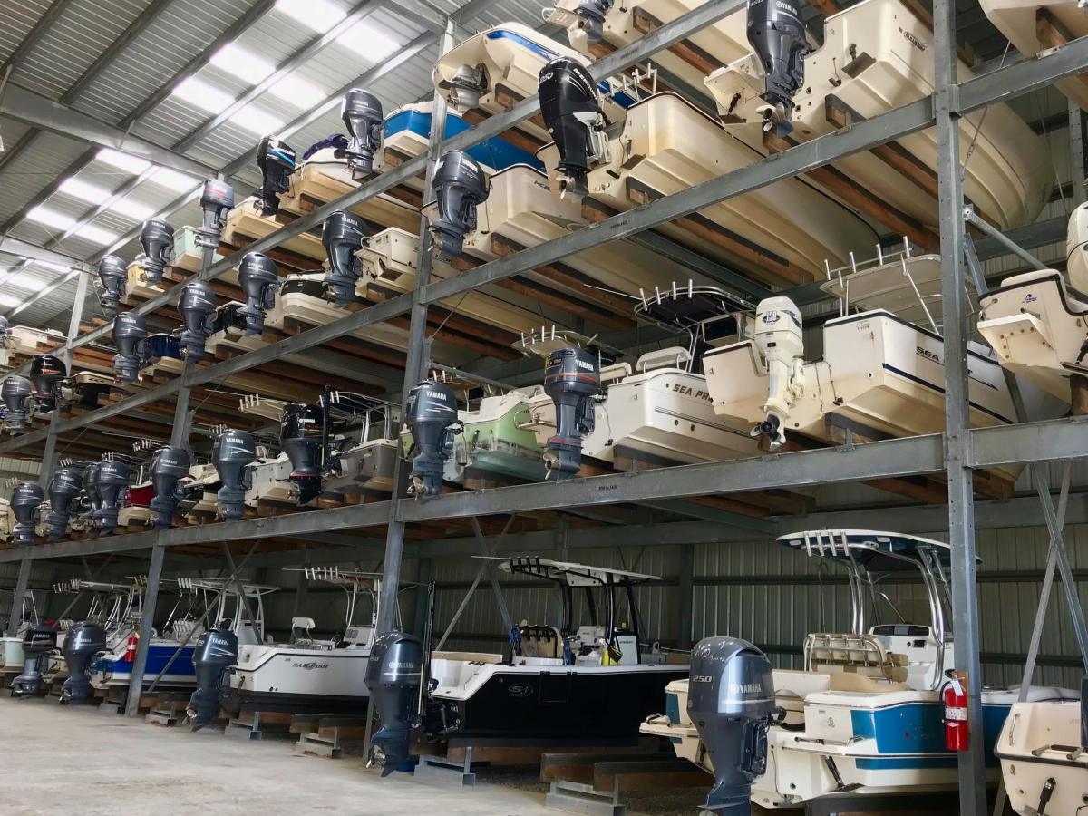31755413_1719521484760892_8085835916851019776_n a group of boats in a boat storage