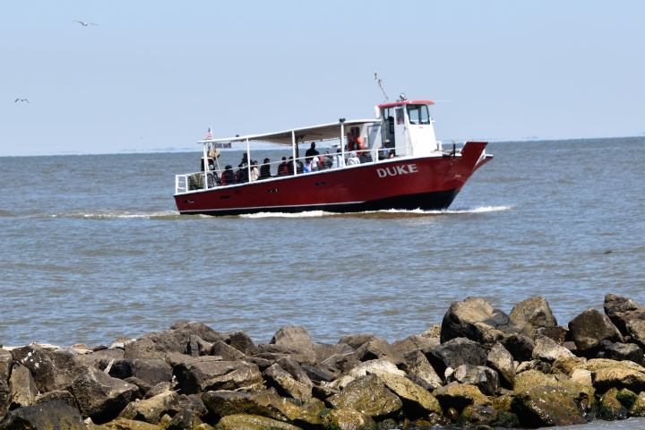 a small boat in a large body of water