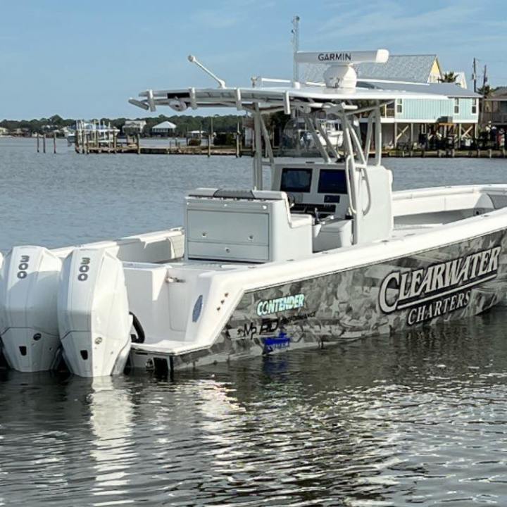 clearwater a small boat in a body of water