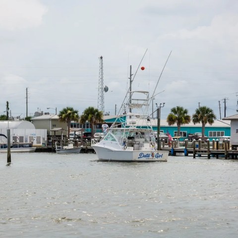a small boat in a harbor