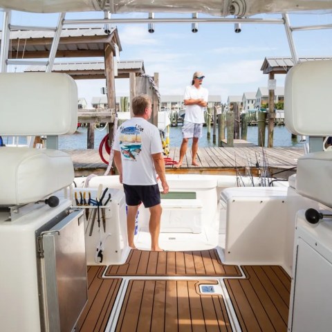 a stove top oven sitting inside of a kitchen