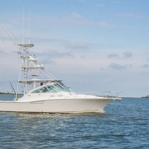 a small boat in a large body of water