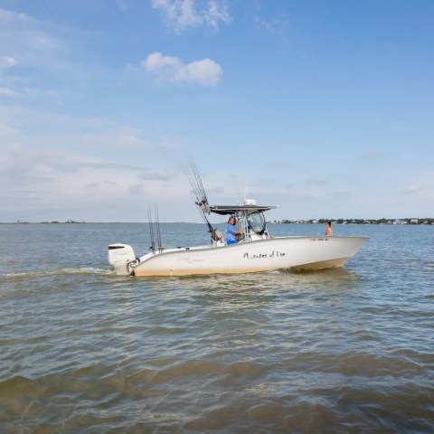 a small boat in a body of water