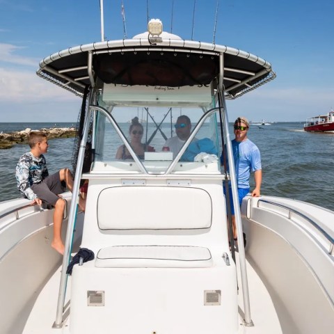 a boat is docked next to a body of water